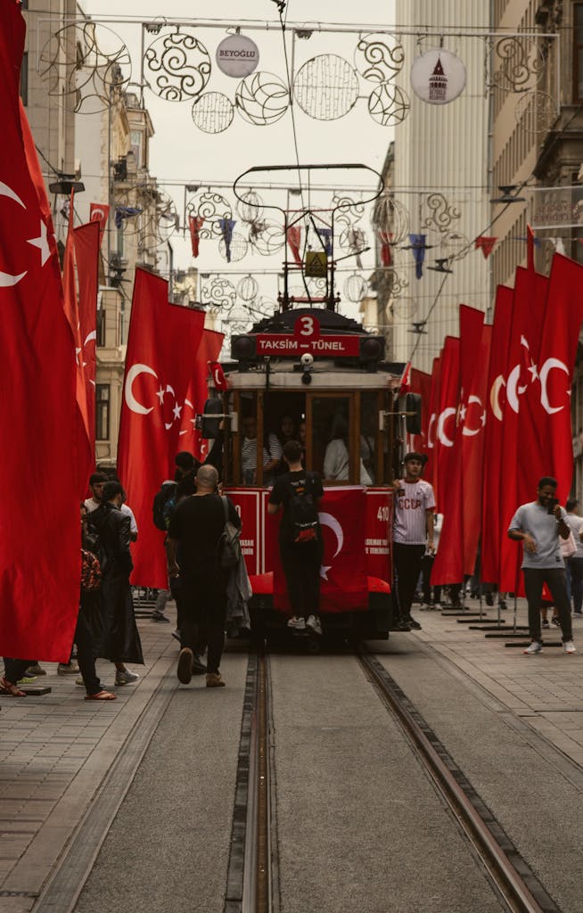 A Tram on a Turkish Street Decorated with Flags